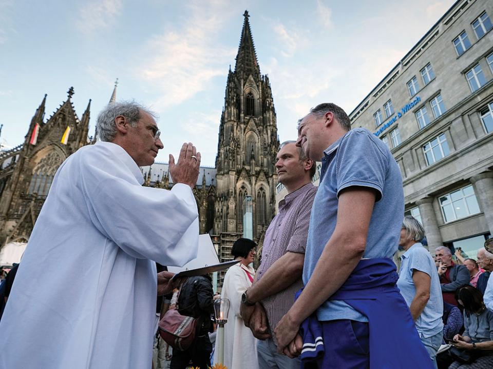 Same-sex couples take part in a public blessing ceremony in front of the Cologne Cathedral in Cologne, Germany, on Sept. 20, 2023. Photo by /Martin Meissner/AP.