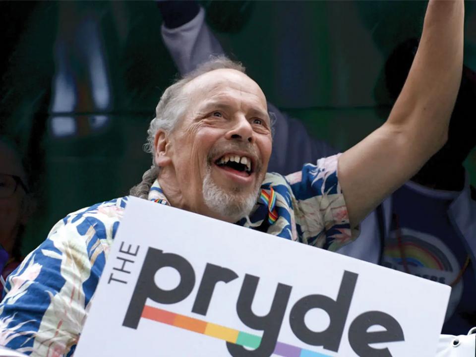 Eddie Whitman, a resident of the Pryde, celebrates Boston's Pride parade in 2025. Screenshot via "Living in Pryde."